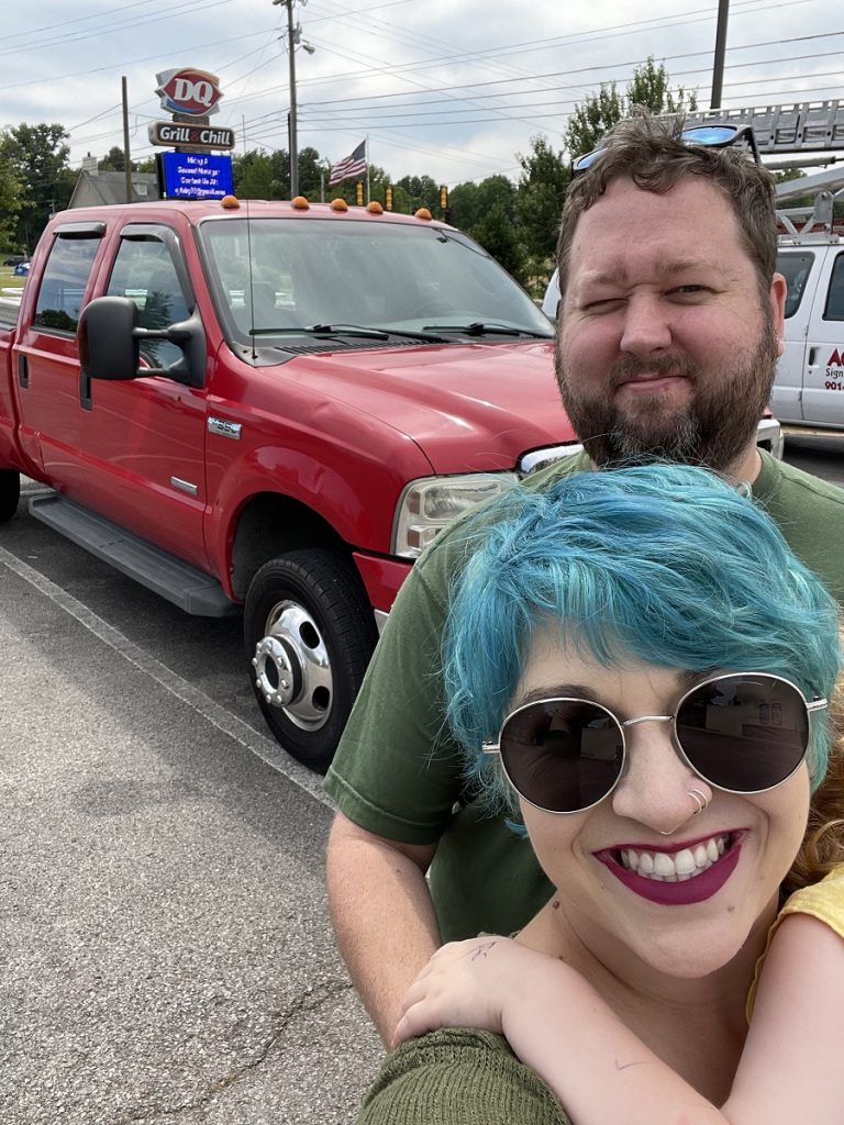 Smiling with our truck